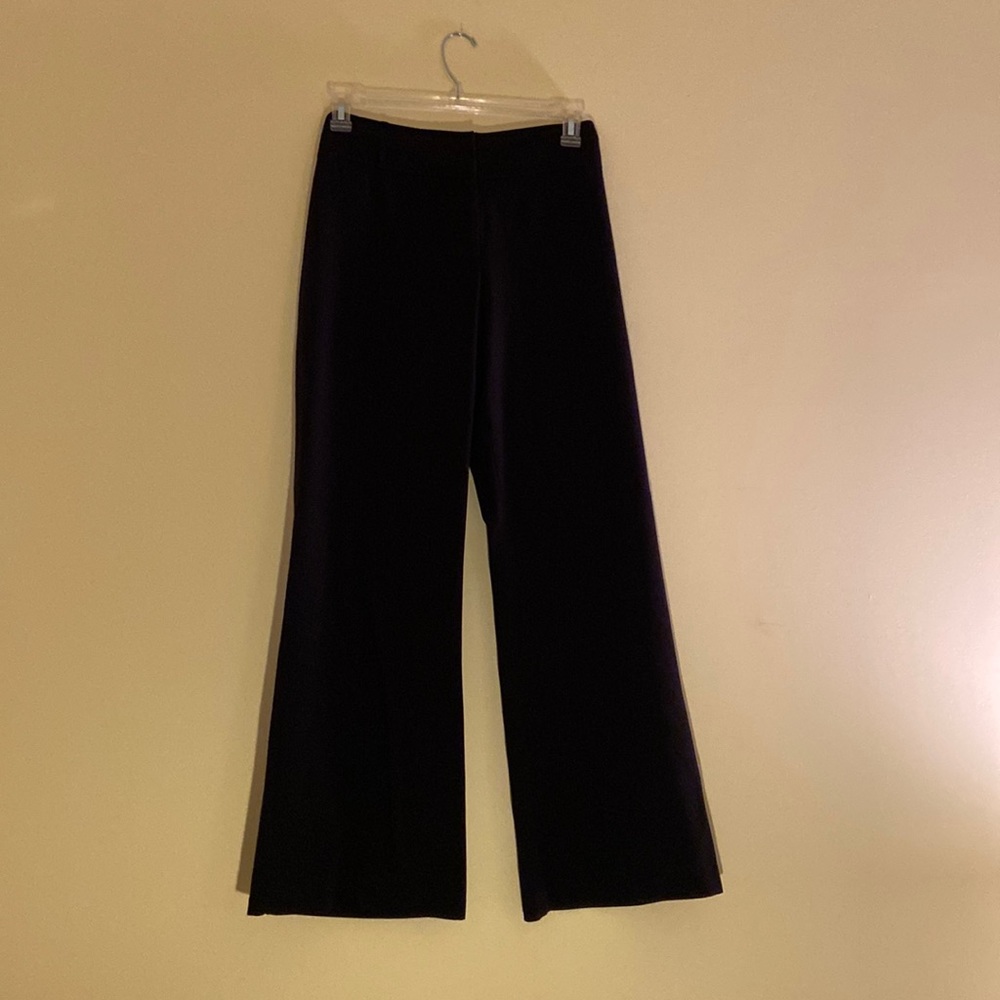 Black mid rise dress pants.